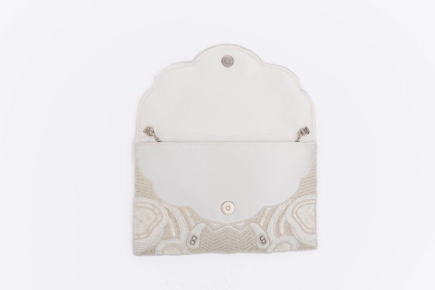 white hand beaded bag